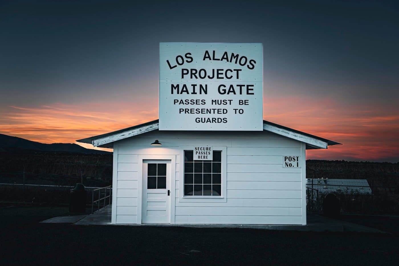 Los Alamos Project Main Gate at dusk — historic federal security checkpoint